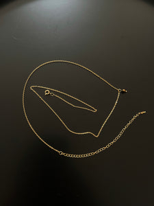 golden body chain out of stainless steel with small tiger eye pearls