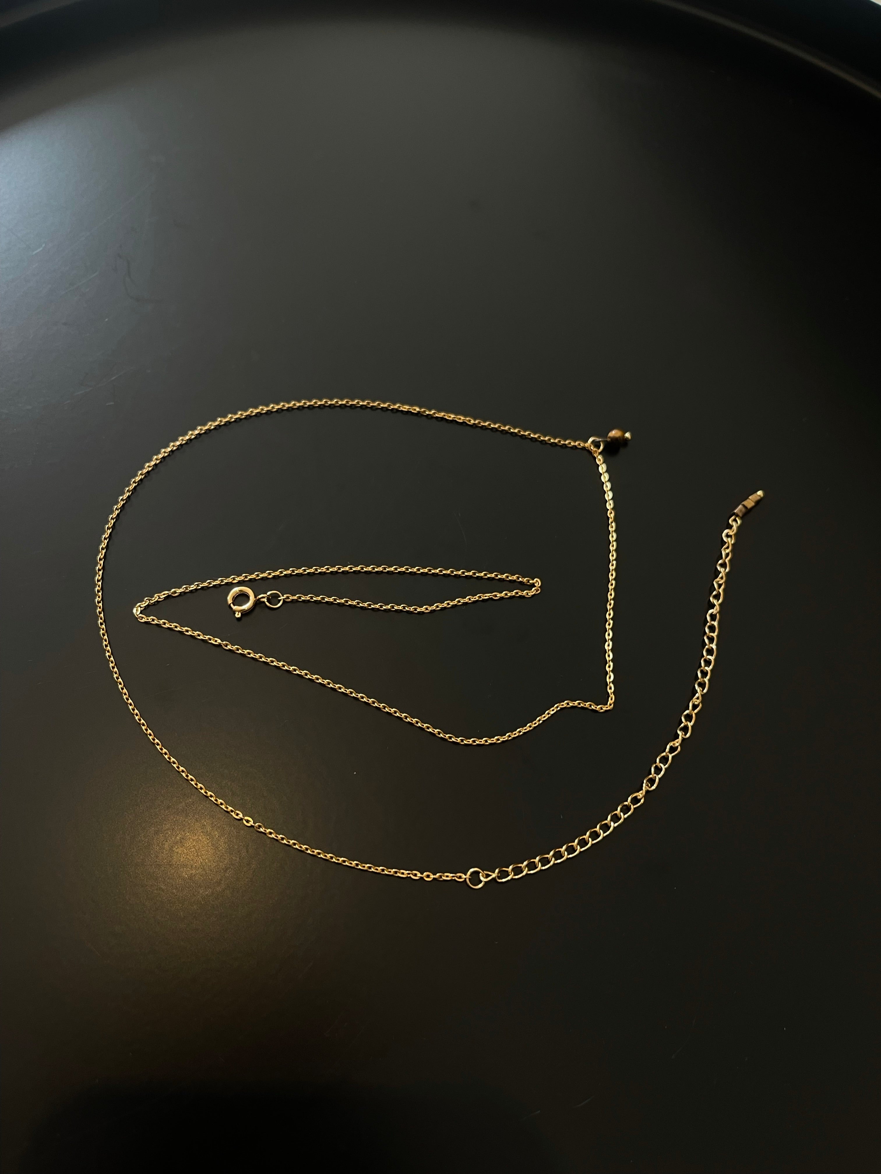 Gold plated stainless steel body chain with tiger eye gemstones. 
